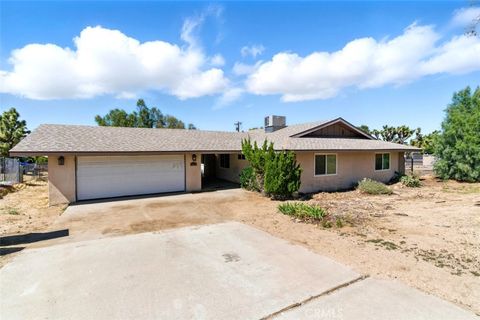 Photo of 56620 Hidden Gold Drive, Yucca Valley, CA 92284 (MLS # IV25110324)