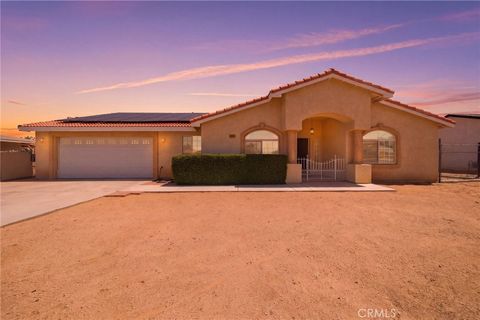 Photo of 14083 Pawnee Road, Apple Valley, CA 92307 (MLS # HD26095179)