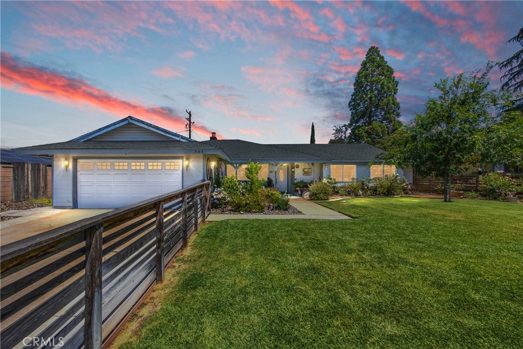 Welcome to this cozy, single-story home on a spacious 9,583 SF lot in the serene neighborhood of Calimesa. Featuring 4 bedrooms and 3 bathrooms across 2,090 SF of thoughtfully designed living space, this home strikes the perfect balance of comfort and convenience. Stylish and Durable Flooring – Premium tile and laminate flooring flow throughout the home, creating a cohesive and low-maintenance living environment. The Kitchen and bath were updated just a few years ago, featuring light wood cabinetry and solid-surface counters. The hall bath has also been refreshed. The inviting Living Area with fireplace hearth anchors the living room, perfect for cozy evenings. The private, fully fenced backyard features a covered patio and mature fruit trees, creating a relaxing entertaining space or peaceful retreat. Convenient One-Level Layout ensures easy access and functional flow, ideal for all stages of life. Generous Parking – An attached 2-car garage plus additional driveway space ensures ample room for vehicles and storage.
Ideally located on a quiet street without HOA restrictions, this home offers a rare combination of practical updates and move-in readiness. Perfect for families, downsizers, or anyone seeking comfort without compromise, the property stands out with its dual primary bedrooms, flexible floor plan, and intimate outdoor sanctuary.