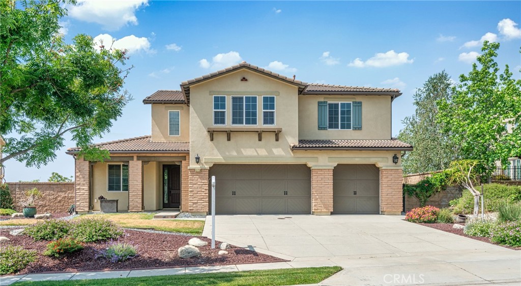 This beautifully maintained former model home is located in the prestigious gated community of Rancho Etiwanda Estates, offering a perfect combination of elegance, comfort, and convenience. Set against the Angeles mountains, the property enjoys a stunning 180-degree view of San Gabriel Valley’s city lights and backs directly onto the North Etiwanda Preserve. Featuring 4 bedrooms and 4 bathrooms, including a private downstairs en suite ideal for guests, the home is thoughtfully designed with tasteful upgrades such as plantation shutters, designer curtains, built-in cabinets, and high-end KitchenAid appliances. The spacious layout includes a formal dining room, open family area, dedicated study with mountain views, and an upstairs loft with additional storage. The master suite showcases coved ceilings, a stained-glass window, double vanities, and a soaking tub overlooking scenic valley views. Located within a top-rated school district (9/10/9), the home is just minutes from Victoria Gardens, Ontario Mills, and Ontario Airport, with grocery stores, gyms, and restaurants all within a 5-mile radius. The home has been exceptionally well cared for and still looks like it did when first purchased 11 years ago. It can also be sold fully furnished, preserving its original model home character.