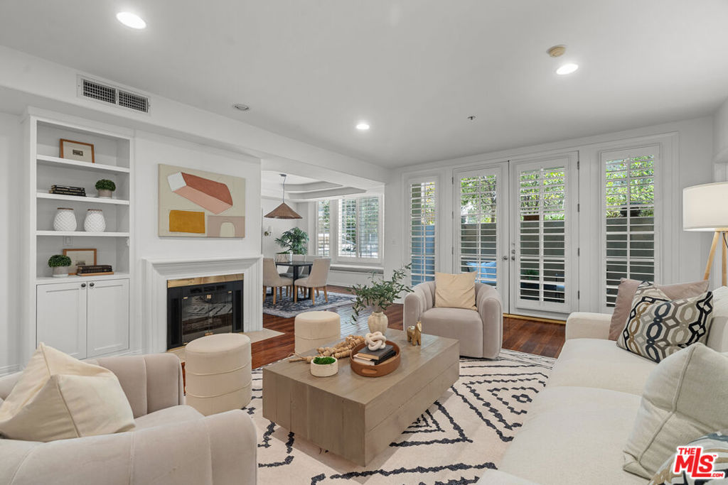 Located in one of Brentwood's most desirable buildings, this refined escape blends comfort, space, and style in a prime Westside location. This 3-bedroom, 2.5-bathroom condo offers a generous floor plan and an inviting living area completed with a built-in bar and oversized glass doors that open up to two private patios, making it perfect for indoor-outdoor living and entertaining. The kitchen includes stainless steel appliances, granite countertops, and ample cabinet space, while the formal dining room offers an ideal setting for hosting family and friends. The spacious primary suite is a true sanctuary with a large walk-in closet and a spa-inspired bath boasting a soaking tub, dual vanities, and a separate shower. Two additional bedrooms offer flexible use as guest rooms, home offices, or creative spaces. Other highlights include central HVAC, an in-unit laundry room, and two assigned side-by-side parking spots in a gated underground garage with generous guest parking. Additionally, residents enjoy access to premium amenities including a pool, sauna, gym, and a recreation room ideal for entertaining. All just moments from Brentwood's best shopping, dining, and lifestyle destinations, including the Brentwood Country Mart and Brentwood Country Club.