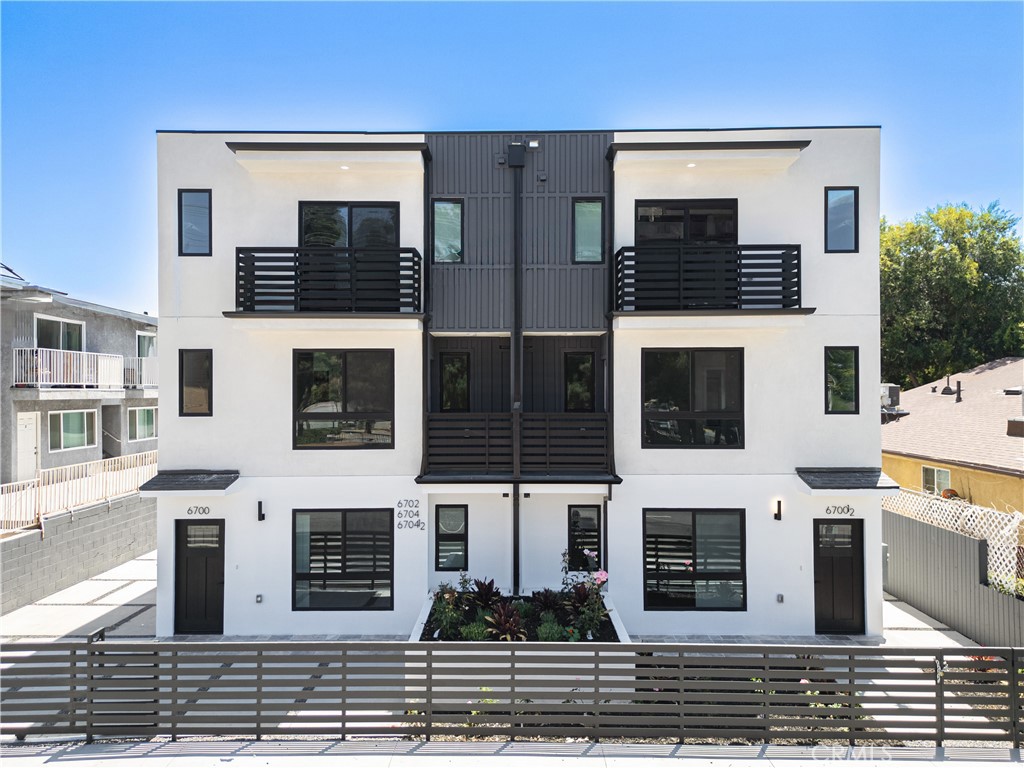 MOVE IN READY TODAY: 100% BRAND NEW CONSTRUCTION UNIT featuring large 5 bedrooms and 4 full bathrooms with an attached 2 car garage, located in downtown Van Nuys, everything you need is within driving distance. The floor plan offers modern living at its finest with a functional 1,735 SQ FT of usable space. This unit has two balconies and in-unit laundry facilities. Ascend to the expansive, luminous open concept living area & combined kitchen & dining area. Enjoy privacy and tranquility in your new home. Retreat to the primary bedrooms featuring a luxurious en-suite bath and ample closet space. All bedrooms offer generous dimensions and large closets. Embrace the essence of community living & make this your home today! 6700 Kester Ave is part of a 5 Unit resident community located in Van Nuys neighborhood 91405-zip code. Stove, refrigerator, dishwasher, microwave hood vent & washer/dryer included. Central AC/HVAC. Conveniently located in a prime location, near schools, shopping, golf courses, recreational areas, dining, and easy access to major freeways, this property offers an outstanding easy live, work and play lifestyle. This unit is perfect for a multi-generational extended family or the working adults that prefer to enter into a co-living set up. Call today and book your private tour.