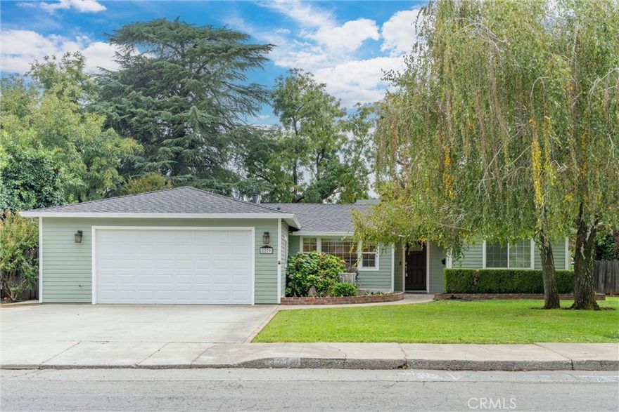 Looking for your own park-like setting, located right in the heart of Chico? This hard-to-find property boasts over two-thousand square feet, four spacious bedrooms, two full bathrooms, an attached oversized two-car garage—all situated on nearly three-quarters of an acre. Close to excellent schools and ample shopping, this home has a recently renovated kitchen and bathroom and a large laundry room with a full wall of pantry storage and shelving. With both living and family rooms, and an expansive patio off the kitchen, the house and yard are ideal for entertaining. The step-down family room has vaulted ceilings and a beautiful brick hearth with a new wood stove. But the heart of this property is its sprawling backyard and mature walnut and dogwood trees, providing a peaceful setting with plenty of shade. Relaxing on the patio feels like gazing out over a park with the sweeping lawn area, basketball court, and play structure. The back portion of the property boasts a chicken coop and run, eighteen producing fruit trees, which include peaches, nectarines, plums, cherries, one pear tree, an orange tree, and a mandarin tree, set-up on timed sprinklers and drip-lines. A fenced-off section has raised garden beds and two long rows of Olallieberries and Marionberries, yielding gallons and gallons of blackberries every summer. The property also has two storage sheds and a carport with RV parking potential. With a brand new Certainteed Landmark TL 50-year roof, newly installed flooring throughout, new paint, a decorative water fountain and flower garden, the home is an uncommon gem. This rare property won’t last long.  Come check-out this peaceful retreat in the center of Chico!