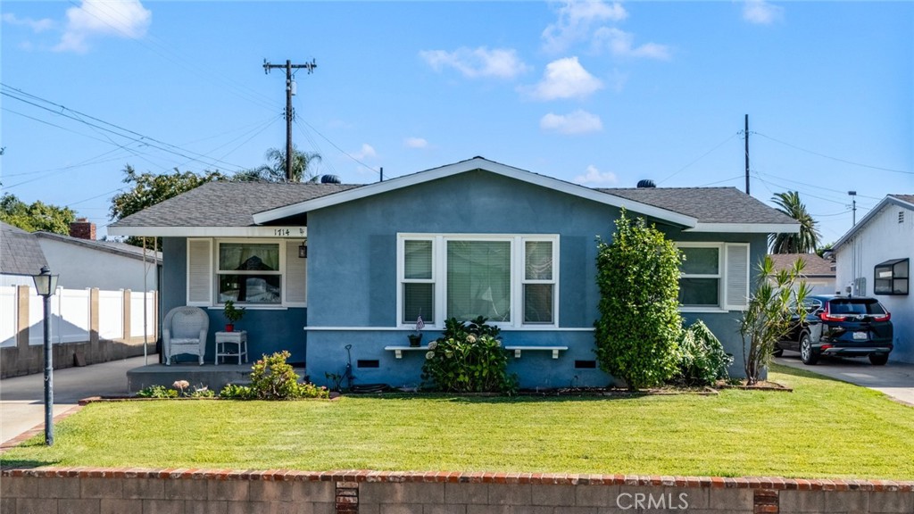 Located in a cul-de-sac 1714 East Linfield has been home to this Seller for over 20 years – a testament to the quality of life you will experience here. As you arrive at 1714 East Linfield the wonderfully manicured lawns, updated windows and quaint front porch let you know that this is a home that has been loved by it’s owners. Step inside and you are greeted by a spacious living room abundant with natural light and wonderful views of the San Gabriel Mountains. Just off of the living room is the dining room that also enjoys wonderful views of the San Gabriels. The efficient kitchen has plenty of counter and cabinet space making it a cinch to prepare your favorite meals for the ones you love. Just off of the kitchen is the indoor laundry area, half bathroom, and door leading to the covered patio. This efficient design makes 1714 East Linfield an ideal place to live comfortably as well as to entertain guests! The covered patio looks out onto the spacious lawn and garden where you can easily play catch or let your four legged loved ones roam. There is a two car garage with a small workbench making it a cinch to garden in this spacious yard! Of course, there is more to a home than the outdoors and entertaining. 1714 East Linfield has a full bathroom in the hall area that services the three bedrooms in this home. Each of the bedrooms have ample space but one of the three really packs a punch! The largest of the three bedrooms is a versatile space that you can use as your primary bedroom with room for a sitting area and a large dressing area. If that’s not your style and you don’t need all three bedrooms then this could be a wonderful living room, family room or retreat! Whatever your heart desires 1714 East Linfield can probably fulfill the desire. I invite you to come and see all that this wonderful home has to offer you!