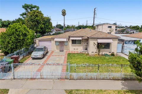 Photo of 1903 N Grape Avenue, Compton, CA 90222 (MLS # RS26116563)