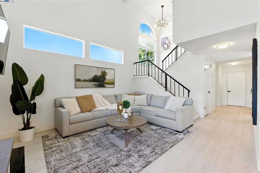 Welcome to this beautifully designed 3-bedroom, 2.5-bathroom townhouse in 1,481 sqft living space. Thoughtfully crafted with upscale finishes throughout, this home offers a lifestyle of elegance and ease. This home features hardwood floors throughout the main living spaces. Enjoy high ceilings, creating an open and airy retreat. Step into the kitchen, complete with stainless steel appliances and sleek stone countertops ideal for cooking and entertaining. The modern bathrooms feature contemporary fixtures and refined finishes, including a dual vanity in the primary en-suite bath. Step outside into your private patio, perfect for relaxing evenings or entertaining friends and family. This home is ideally situated beside a peaceful greenbelt, with no shared wall on one side for added privacy. Residents also have access to a community pool, enhancing the neighborhood experience. Located just minutes from local restaurants, within a mile of Safeway, and close to schools with convenient access to I-80, this home offers both tranquility and connectivity. Don’t miss your chance to own this exceptional property.