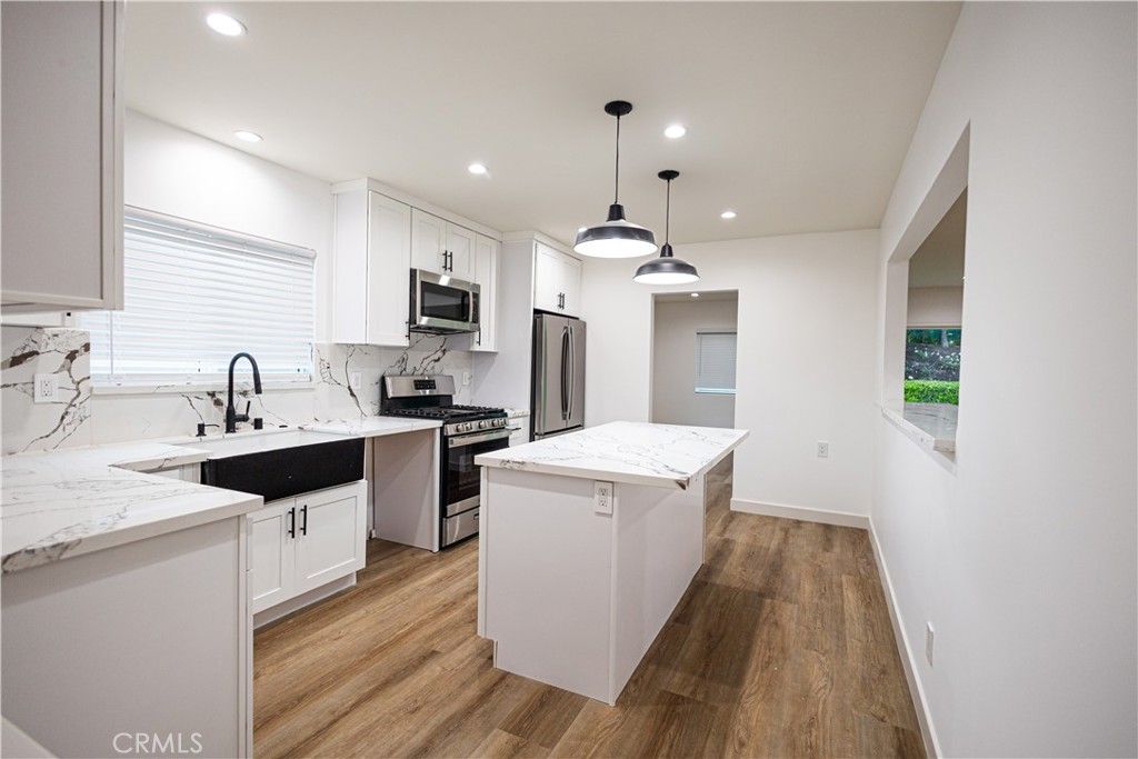 Photo of 22257 Macfarlane Drive, Woodland Hills, CA 91364 (MLS # SR25228840)