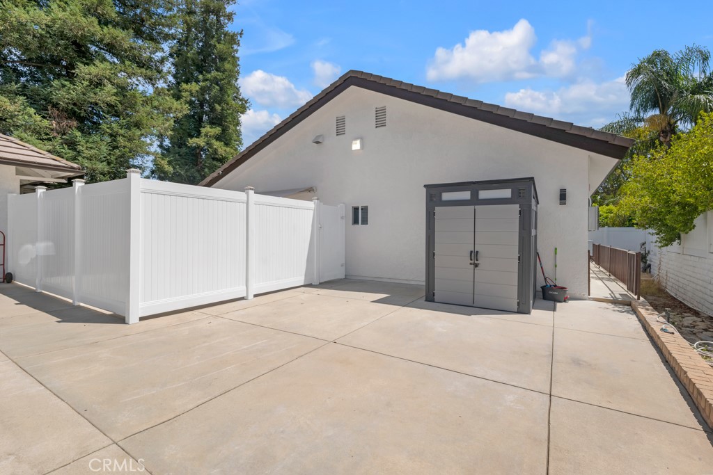 This fully remodeled home in prime Porter Ranch neighborhood boasts 4 bedrooms and 3 full baths with 1600 sqft of living space offering modern comfort and style. The home features new floors, recessed lighting, high ceilings, and an open floor plan that creates a bright and airy atmosphere. The spacious kitchen is equipped with sleek white cabinets, black quartz countertops, and new appliances, perfect for culinary enthusiasts. Two of the bedrooms are primary suites with large closets, while the other two bedrooms share a full bathroom. Convenience is key with an in-unit washer and dryer. Enjoy outdoor living on the spacious and private patio. Centrally located, this property is close to shops, restaurants, and the 118 Freeway, providing easy access to everything you need. For added peace of mind, the property is gated for security. ***All utilities are included in the rent***