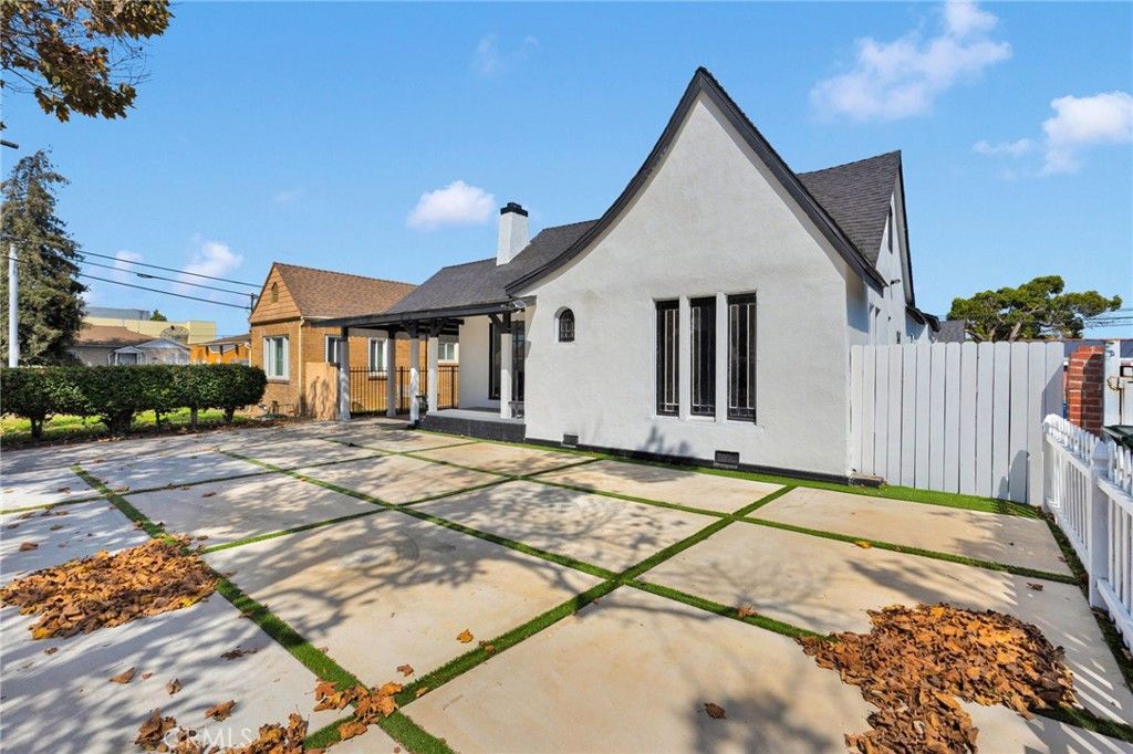 Photo of 8704 S Denker Avenue, Los Angeles, CA 90047 (MLS # IV25198143)