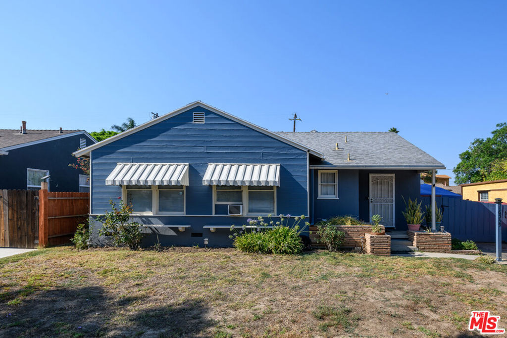 Located in one of Lake Balboa's most desirable pockets, just one block from the sought-after Lake Balboa Park, this home is a rare find for investors or buyers eager to create their dream residence. Inside, you'll find original hardwood floors, a permitted bonus sunroom, and an updated plumbing system. The detached garage features a large extension, perfect for a workshop, studio, or additional storage. And for something truly unique, the property boasts an underground fallout shelter you have to see to believe. The expansive lot is larger than most in the neighborhood, offering endless potential for outdoor living, gardening, or future expansion, or an ADU. Enjoy easy access to multiple golf courses, the Encino Farmers Market, the Japanese Garden, Sepulveda Basin Dog Park, and more. With its prime location and exceptional potential, this home is ready to be transformed into something extraordinary.