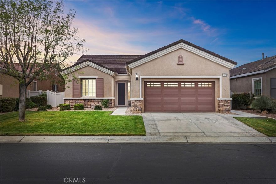 Tucked inside the friendly gates of Solera at Del Webb in Apple Valley, this cheerful 2-bedroom plus den Hawthorne Model is ready to welcome you home. Imagine mornings spent sipping coffee in your sunny breakfast nook and evenings relaxing by the decorative fireplace — all in a spacious, easy-living layout that just makes sense. The kitchen opens right into the great room (perfect for casual entertaining or late-night snacks), while the primary suite spoils you with a roomy walk-in closet and a bath featuring both a soaking tub and separate shower. You’ll love the peaceful lot, protected from the wind with plenty of sunshine — ideal for patio lounging or a little light gardening. And when you’re ready to get out and about, life in Solera has something for everyone — from indoor and outdoor pools and spas to tennis and pickle ball courts, bocce ball, and even a 27-hole golf course that winds through the community. Two clubhouses host fitness centers, billiards, table tennis, a ballroom, library, and an outdoor amphitheater — all part of a vibrant, resort-style 55+ lifestyle that makes every day feel like vacation.