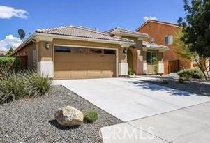Photo of 12355 Griffin LN, Victorville, CA 92395 (MLS # HD26216305)