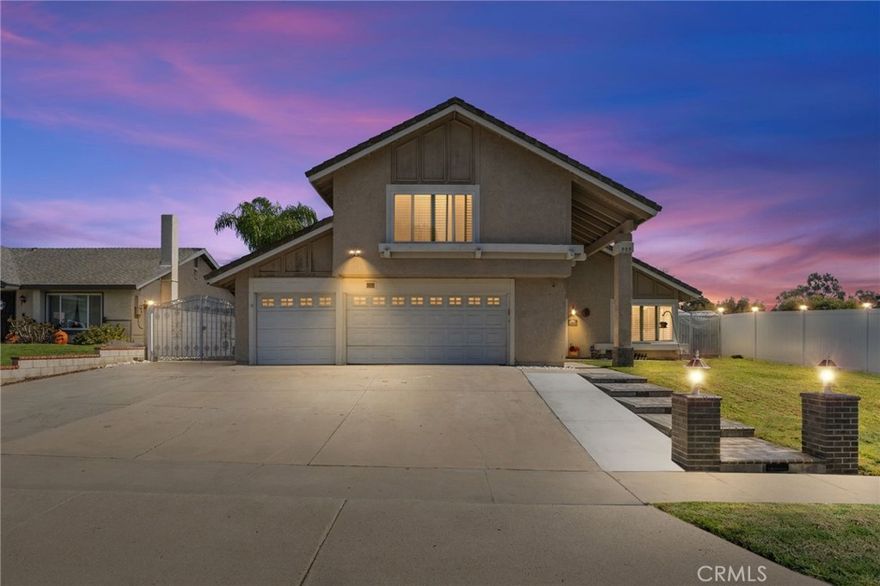 Welcome to this beautifully upgraded home in the heart of Corona, where modern comfort meets elegant design. Every inch of this property has been thoughtfully enhanced with top-quality finishes and energy-efficient systems for a true move-in ready experience.



Step inside to find a completely remodeled interior featuring new central air conditioning, central heating, and air ducting throughout, ensuring year-round comfort. The remodeled kitchen is a chef’s dream with new cabinets, KitchenAid appliances including a triple oven, farm sink, pot filler, stove, ventilator, and kitchen window. Elegant ceramic and porcelain flooring, crown molding, and remote-controlled blackout shades elevate every room.



The cozy den features a remodeled gas/wood fireplace and double French doors that open to the expansive backyard retreat. The remodeled den bathroom includes a new sink and toilet, while the converted office or 5th bedroom offers modern functionality with USB/C charging outlets, new internet and phone hookups, mini split AC/heater, and separate outdoor entry—perfect for remote work or guests.



Upstairs, the primary suite is a true sanctuary with a fully remodeled bathroom featuring Italian marble floors, a luxury waterfall shower system with multiple jets, double sinks, illuminated fog-resistant mirrors, and bidet toilet. 



This home is equipped with a whole-house water filtration system with reverse osmosis and alkaline drinking water, providing clean, refreshing water throughout.



Outdoor living is unmatched with a new double-insulated aluminum wraparound patio (24’x24’ + 15’x36’) complete with five ceiling fans, dimmable lighting, and power outlets on every pillar. Enjoy the lush landscaping, new grass, palm trees, garden nursery, and automatic irrigation systems. The gazebo with lighting and power makes entertaining effortless.



Energy efficiency abounds with a new 5KW solar system, backup battery, and renewable energy panels, complemented by new double-pane windows, security cameras, and a front yard with vinyl fencing, solar-lit walkway, and extended driveway, RV parking.



This exceptional home offers the perfect blend of luxury, sustainability, and functionality—all within minutes of shopping, schools, and freeway access. A true Corona gem ready for its next owner!
