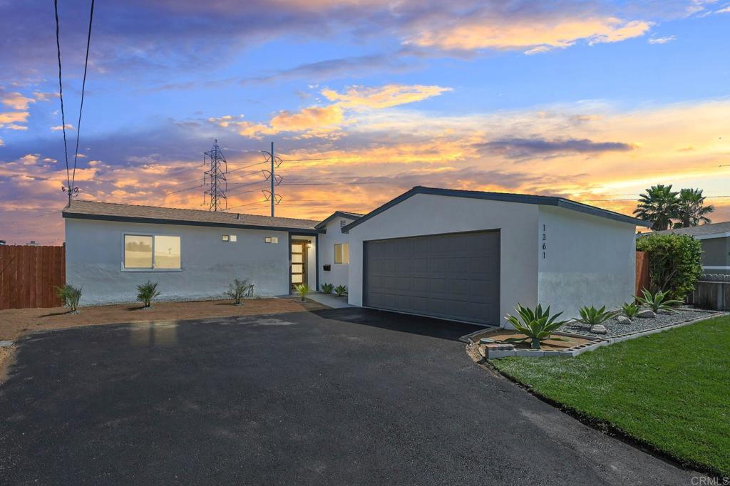 This beautifully renovated home has undergone a full transformation, offering modern design, quality finishes, and peace of mind with major upgrades including new plumbing and electrical. The open-concept layout is light and bright with recessed lighting, fresh paint inside and out, and brand new LVP flooring, baseboards, and doors throughout. The all-new kitchen features new cabinets, quartz countertops, a breakfast bar, stainless steel appliances with gold accents, and a large slider off the dining area that open to a private backyard. Both bathrooms have been completely redone with custom tile showers, and each bedroom is enhanced with modern ceiling fans. Additional highlights include an oversized two-car garage with a new motor, new HVAC mini splits, all-new windows and sliding glass door, and updated exterior landscaping. Situated on a quiet cul-de-sac within walking distance to the local elementary school and Palomar Park, and just minutes from convenient freeway access, this home combines comfort, style, and location.