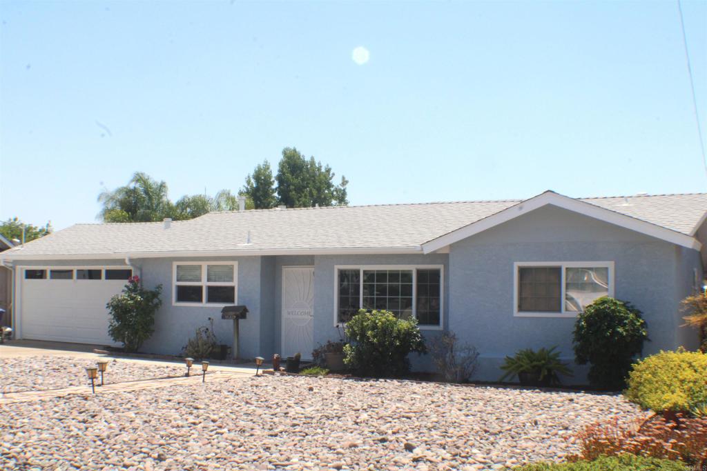 Beautiful 4 bedroom 2 bath home is waiting for you in quiet Garden Road neighborhood. Amazing Poway neighborhood with outdoor activities near by. Walking distance to Garden Road Elementary and Garden Road Park, hiking trails and horse trails. A few miles away from Lake Poway. Close to shopping and restaurants. So much work done to this home. Move- in ready. Newer roof and gutters and rain harvesting tanks.... New kitchen with Bosch dishwasher, quartz counter top and subway tile back splash...New bathroom...New garage door with panel key pad....newer water heater...New flooring.. No popcorn...New paint inside and out. New sprinkler system in the backyard with new sod....Newer attic Fan installed...Front yard boasts low maintenance rockscape. This home has endless possibilities boasting a living room as well as a family room, perfect for a game room. Beautiful mountain views from the family room and master bedroom. Master has French Doors and a walk-in closet. Large 7000 square foot lot. Room for RV Parking as well as a beautiful raised garden area.