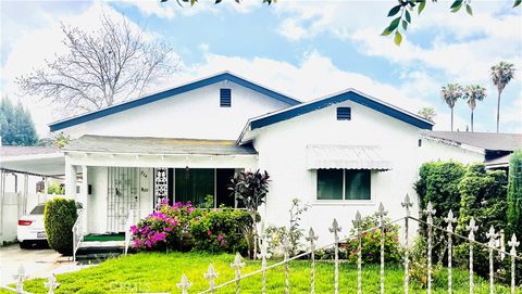 Photo of 214 E 92nd St, Los Angeles, CA 90003 (MLS # OC25276707)