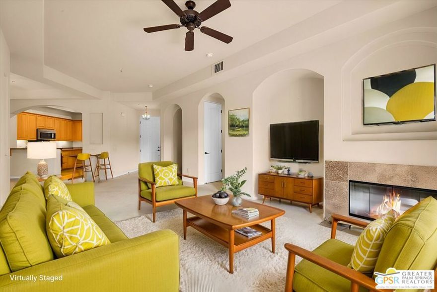 Welcome to Villa Portofino! Premier 55+ Living in Palm Desert! Step into luxury and ease with this beautifully designed 2-bedroom, 2-bathroom + den/office condominium, offering 1,559 sq. ft. of comfortable, single-level living - no stairs, no hassle! Perfectly situated on the first floor, this sought-after floor plan ensures effortless access, making it ideal for those with mobility concerns. From the moment you enter, you'll be greeted by an inviting open layout, high coffered ceilings, and abundant natural light streaming through charming glass-paneled windows. The spacious kitchen is a chef's delight, featuring maple cabinetry, slab granite countertops, and stainless steel and black appliances, a perfect blend of function and style. The primary suite is a true retreat with a sitting area, a large walk-in closet, and an en-suite bath boasting dual vanities, a separate soaking tub, and a walk-in travertine shower. The guest bedroom, located on the opposite side for privacy, also features a walk-in closet and a beautifully appointed bath. A versatile den/office with wet bar offers flexibility, ideal for a home workspace, hobby room, or additional guest accommodations. The private patio, framed by lush desert landscaping, provides a peaceful outdoor space for morning coffee or evening relaxation. Experience Resort-Style Living! Villa Portofino isn't just a place to live, it's a place to thrive! The community is designed for active adults who want the perfect balance of relaxation, social connection, and recreation. The 30,000 sq. ft. clubhouse is the heart of Villa Portofino, offering a state-of-the-art fitness center, yoga studio, resort-style pool & spa with poolside service, a game room, billiards, a cantina, a 100-seat private movie theater, and a vibrant social calendar filled with special events and activities. Whether you're looking to stay fit, make new friends, or just unwind, there's something for everyone. Looking to get involved? Join one of Villa Portofino's exclusive member clubs, where you can connect with like-minded neighbors through activities like Texas Hold 'Em, Bridge, Mahjong, Bunco, Canasta, Rummikub, knitting, book club, and more! Dine & Unwind at The Bistro! No need to go far for a delicious meal! The Bistro at Villa Portofino serves up chef-inspired seasonal favorites, from fresh salads to hearty sandwiches and signature entrees, all perfectly paired with refreshing cocktails or your favorite bottle of wine. Enjoy daily Happy Hour, a Saturday Bloody Mary Bar & Brunch, Pasta Nights, specialty holiday meals, and rotating chef specials, all just steps from your front door. Members receive a weekly newsletter with the latest dining events, ensuring you'll never miss out on a great meal or social gathering. Worry-Free, Low-Maintenance Living! Your HOA dues include: Cable TV & high-speed internet, Water & trash service, Exterior building & roof maintenance, "walls out" fire and earthquake Insurance, Window washing & landscaping, Full clubhouse access & amenities! Prime Palm Desert Location! Villa Portofino is minutes from top-rated dining, shopping, golf, entertainment, and the Eisenhower Medical Center, offering both convenience and peace of mind. This is more than a home, it's a lifestyle. Don't miss this rare opportunity! Schedule your private showing today and experience the best of Villa Portofino living!