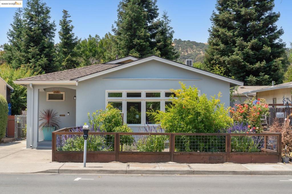 Charming and spacious, this well-maintained home offers easy access to Downtown, Waterfront Park, and the best of Martinez. Inside you'll find two generous bedrooms, an updated bathroom, bright living room, and updated open-concept kitchen. The kitchen features stainless-steel appliances, gas range, a deep farmhouse sink, solid surface counters, and large peninsula to work on (or gossip over). The bonus back room is perfect for an office or workspace, and includes a washer/dryer and handy utility sink. The large detached garage is perfect for a workshop, home gym, or maybe even parking cars. The sunny back deck and patio are the perfect outdoor hangouts for lazy evenings at home. Welcome to your Martinez home!
