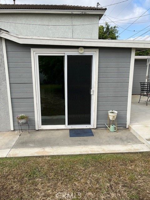 Photo of 10327 Tristan Dr, Downey, CA 90241 (MLS # DW26093294)