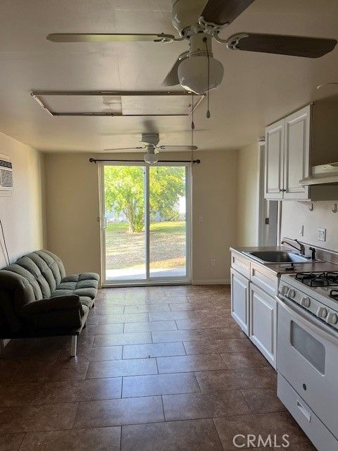 Photo of 10327 Tristan Dr, Downey, CA 90241 (MLS # DW26093294)