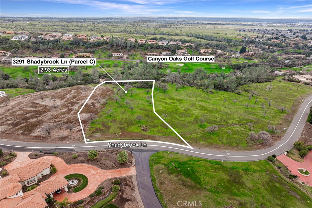 This exceptional 2.93-acre lot in the prestigious Canyon Oaks community offers a rare chance to build the custom home you’ve always dreamed of. Held by one family for over 20 years, this property is perched at a higher elevation above the city of Chico, providing breathtaking, unobstructed views of sunrises, sunsets, and incoming storms—a true retreat surrounded by natural beauty. Located on one of the most desirable lots in the neighborhood, the setting offers ultimate tranquility and inspiration. You'll enjoy the privacy of a gated golf course community with two secure entrances, as well as direct access to the scenic walking and biking trails of historic Bidwell Park. The rear of the parcel slopes gently with striking rock outcroppings that enhance its unique character. This is your rare opportunity to design and build your dream home in one of Chico’s most loved communities.