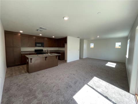Photo of 707 Stone Ridge West Avenue, Merced, CA 95341 (MLS # MC26171952)