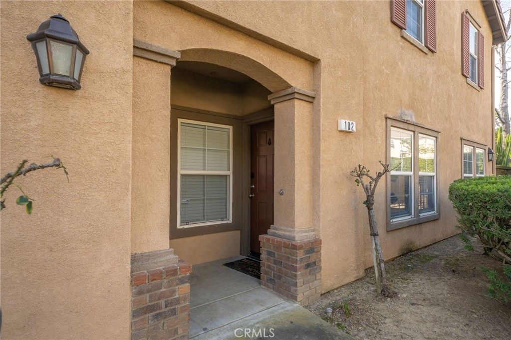 Photo of 7331 Shelby Pl, Unit 102 Pl, Rancho Cucamonga, CA 91739 (MLS # CV26015355)