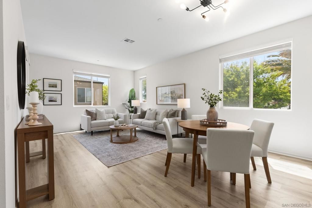 Photo of 5222 Surfwalk Way Way #6, San Diego, CA 92154 (MLS # 260008472SD)