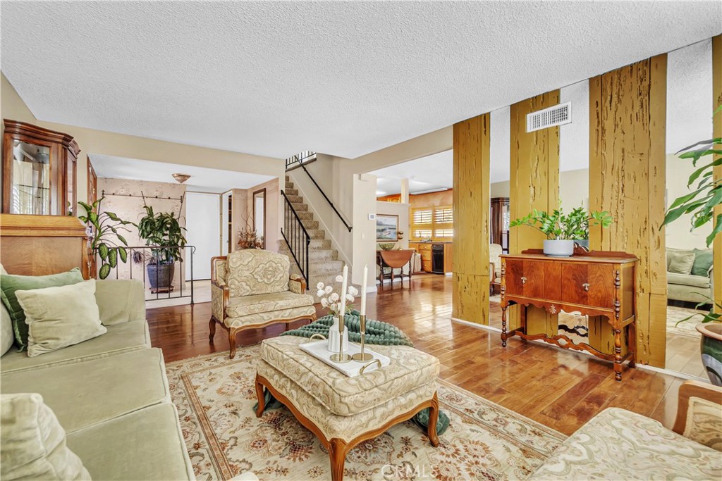 Welcome home to this beautifully maintained two-story house located in the heart of Carson. This spacious home offers the perfect blend of comfort and functionality. Step inside to a warm and inviting living room that flows with ease into the dining room, bonus room, and open kitchen designed for both everyday living and entertaining. Completed with Viking stainless steel appliances, and plenty of cabinet and counter space there is more than enough room to talk, chop, and store! Enjoy the convenience of having your laundry room inside on the first floor. Ready to retreat from it all? Head upstairs where you will find 3 spacious bedrooms and 2 bathrooms. The flexible floor plan includes a Jack & Jill room that can easily be converted into a 4th bedroom, home office, or guest suite. Enjoy California living with both a front and back porch ideal for relaxing or hosting gatherings. The exterior boasts a charming arched entryway, a two-car garage with a custom wood door, and lush landscaping for enhanced curb appeal.
Ideally located just minutes from Cal State Dominguez Hills, Dignity Health Sports Park, and a wide variety of shopping, dining, and entertainment options. Plus quick access to major freeways that make commuting or exploring the city a breeze.