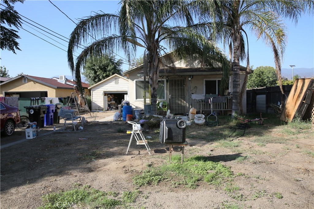 Opportunity knocks with this 2-bedroom, 1-bath home sitting on a generous 7,500 sq. ft. lot. Tucked into an established San Bernardino neighborhood, this single-story property is ready for new owners to bring their ideas and personal touch. Inside, the floor plan offers a cozy living room, a kitchen with granite counters, and a full bath with a granite vanity, shower/tub combo and tile flooring. The home includes central A/C and heating, double-pane windows, and upgraded water and gas lines. With some fresh paint and new flooring, this house can quickly be transformed into a comfortable first home. The extended driveway with gated entry leads to a detached garage already equipped with washer/dryer hookups —making it a great candidate for an ADU conversion. The spacious backyard offers plenty of room to expand, entertain, or simply enjoy outdoor living. This property is being sold AS-IS and is perfect for a starter home. Conveniently located near schools, shopping, and freeway access. Don’t miss the chance to make this house your own—schedule a tour today!