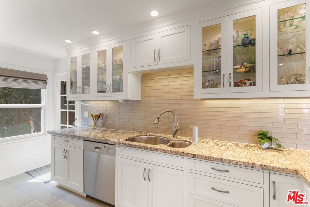 Photo of 4205 Mildred Avenue, Los Angeles, CA 90066 (MLS # 26666523)