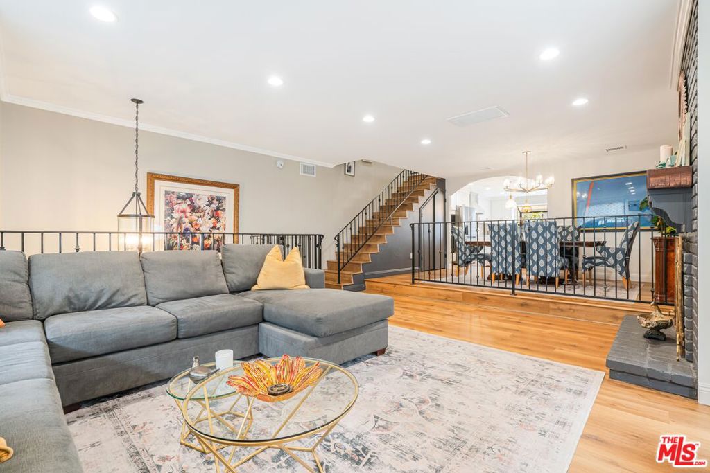 Seller is willing to contribute to buyers closing costs! Welcome to this recently renovated, interior-facing corner unit townhome. Nestled between Tarzana and Encino, this home is just a short walk from "The Boulevard," where you'll find shopping centers, entertainment, and more. This spacious tri-level townhome offers over 2,100 square feet of living space and features a cozy fireplace in the living room, a formal dining room, and a light-filled kitchen with ample storage. Additionally, there's a versatile bonus room for optional use. Each of the three bedrooms is an en suite, providing comfort and privacy. The home also boasts an attached two-car garage and an in-unit laundry area. Recently updated, it now includes brand-new appliances, fresh paint, new flooring, and renovated kitchen and bathrooms. Community amenities include a pool and jacuzzi. Don't miss the chance to see this stunning, move-in-ready property before it's gone!
