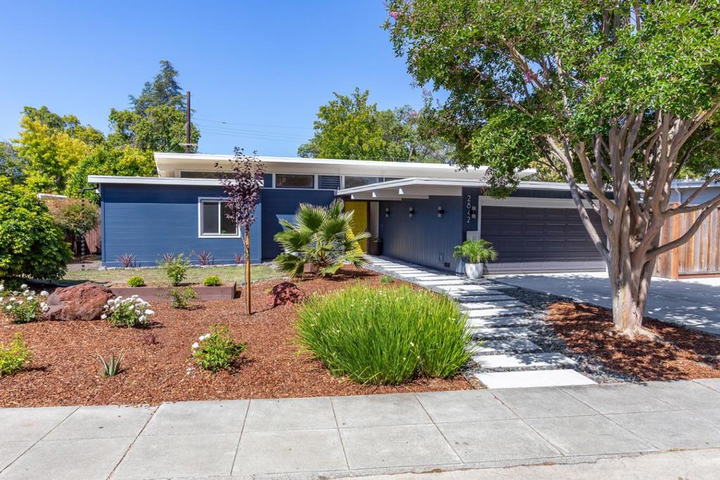 Brimming with beauty, convenience and an abundance of natural light, this Eichler-style home features new wide-plank French oak flooring, upgraded spa-inspired bathrooms, and open-beam, vaulted ceilings. Natural stone finishes (Carrara marble, black slate and granite) and a designer color palette elevate the experience, while the open concept living space welcomes you with unparalleled natural light. The remodeled kitchen features sleek countertops and mosaic tile backsplash, Bosch appliances, and generous cabinetry perfect for both everyday living and entertaining. It also features a walk-in pantry, peninsula bar and light-filled breakfast nook. Enjoy indoor/outdoor extended living with French doors that flow from the living room out onto an inviting, freshly-landscaped back garden with gazebo and fruit trees. Decorative and artistic hardscape offers both beauty and curb appeal, as well as low-maintenance ease. Other convenient features include a large laundry/mudroom, generous storage shed in backyard, and 220v EV smart charger/splitter. Excellent Palo Alto Schools (Palo Verde, JL Stanford, and Pali. Buyer to verify) and just moments from Midtown's shops, cafes, and dining spots and Greer Park, making this home an ideal blend of peaceful retreat and connected lifestyle.