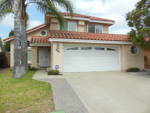 Lovely home located near Guajome Lake. This home offers vaulted ceilings, new paint, upgraded eat in kitchen with custom cabinets, tile floors and newer appliances. There is a formal living and dining room with a separate family room just off the kitchen that has a gas fireplace and lots of custom shelving. Upstairs the master bedroom has his and hers closets and dual sinks in the upgraded master bath.The large backyard has a covered patio, stamped concrete slab and awesome western views. Neighborhoods: Lakeview Estates Complex Features: ,, Equipment: Dryer,Garage Door Opener, Range/Oven, Shed(s), Washer Other Fees: 0 Sewer: Sewer Connected Topography: LL