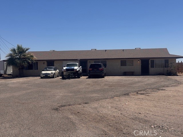 Don't miss out on this investment opportunity! This TRIPLEX with views of the Colorado River on Tribal Land is one you wont want to miss. Two units are currently occupied. There are 2, 2 bedrooms, 1 bath and 1, 1 bedroom, 1 bath. Rent out to snow birds, have a getaway of your own or even live in one while renting out the other two. So many opportunities.