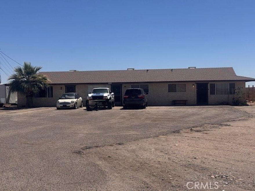 Don't miss out on this investment opportunity! This TRIPLEX with views of the Colorado River on Tribal Land is one you wont want to miss. Two units are currently occupied. There are 2, 2 bedrooms, 1 bath and 1, 1 bedroom, 1 bath. Rent out to snow birds, have a getaway of your own or even live in one while renting out the other two. So many opportunities.