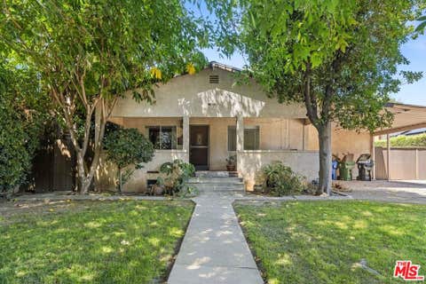 Photo of 5723 Stansbury Avenue, Sherman Oaks, CA 91401 (MLS # 26853863)