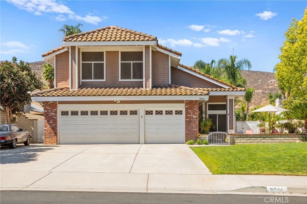 LOCATION, LOCATION, LOCATION!!! Welcome to this stunning 4-bed 3-bath in highly desirable family community of South La Sierra area in Riverside. Upon entry you will find the open foyer with high ceilings, copper honed slate flooring, and shutter blinds surrounding the entire home. The beautiful kitchen located in the center with granite counter tops and stainless steal appliances. Right by you will encounter the spacious living room with a natural wood burning fireplace. Upstairs you will find the master bedroom with end-suite bathroom, dual sink vanity, walk in closets, with an amazing new shower and bathtub. Continuing down the hall is a full bath with and 3 more spacious rooms. Through the lovely permitted sun room from the downstairs family room, step outside to your own private IN-GROUND POOL and SPA area. Enjoy your private oasis with an abundance of fruit trees. From grapefruit, lemons, oranges, peach, plums, avocados, you name it! If you enjoy gardening then you're in luck. But that's not all. You will also find a beautiful paint studio and a roomy shed for extra storage. You can enjoy and sit by the gas fire pit to enjoy your amazing backyard. Did I mention NO HOA and PAID-OFF SOLAR! It cannot get better than this. Conveniently located near 91 freeway, schools, shopping and dining. This is what you're looking for, so don't hesitate to make this your home today!