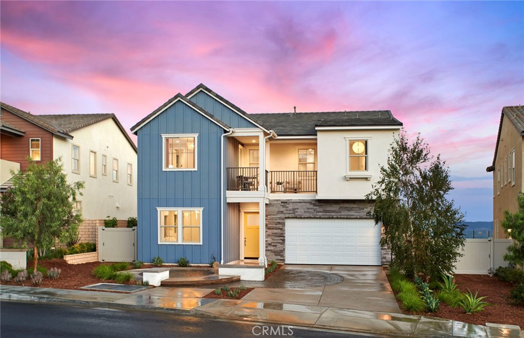 Gorgeous Plan 2 Model Home now available! Breathtaking city view with an entertainer's backyard to enjoy. The interior boasts beautiful floating staircase, an upgraded granite countertop and upgraded flooring throughout. Ready for immediate move-in!
-Three panel slider
-Floating staircase
-First floor bedroom suite
-Balcony
-Front exterior balcony
-Outdoor fireplace