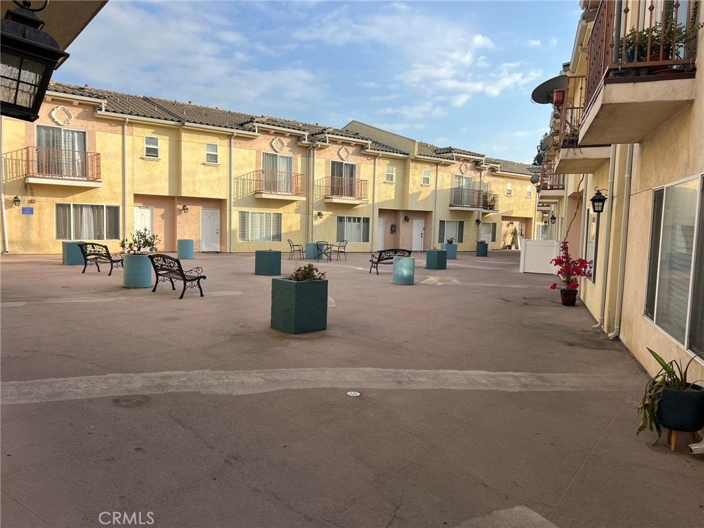 Photo of 12375 Osborne Place Pl #07, Pacoima, CA 91331 (MLS # SR25215405)