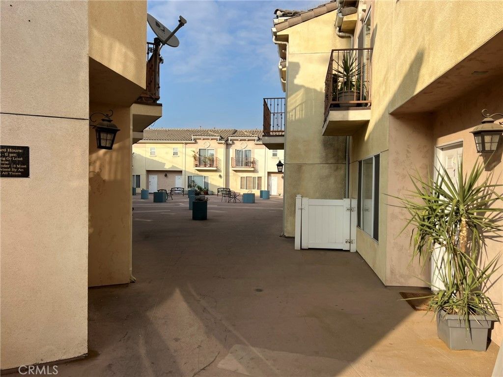 Photo of 12375 Osborne Place Pl #07, Pacoima, CA 91331 (MLS # SR25215405)