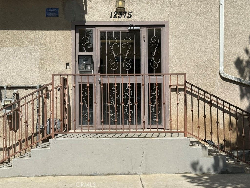 Photo of 12375 Osborne Place Pl #07, Pacoima, CA 91331 (MLS # SR25215405)