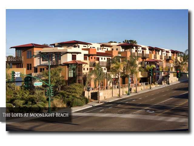 Large south west facing end unit with spectacular Ocean Views! Bright, cheery, lots of glass throughout. 2 Bedrooms, 2.5 baths, den, spacious family area and an ocean view mezzanine with slide away walls. Newer development completed in 2009. Upgraded Bosch appliances and stone countertops. Hand-scraped maple wood floors through out main living areas such as living room, dining room, kitchen, hallways and stairs. Washer and dryer and AC included in the unit. 2 Blocks to the beach. Neighborhoods: Moonlight Beach