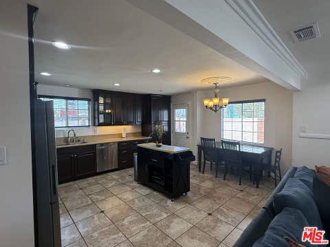 Photo of 8701 Kittyhawk Avenue, Los Angeles, CA 90045 (MLS # 26861121)