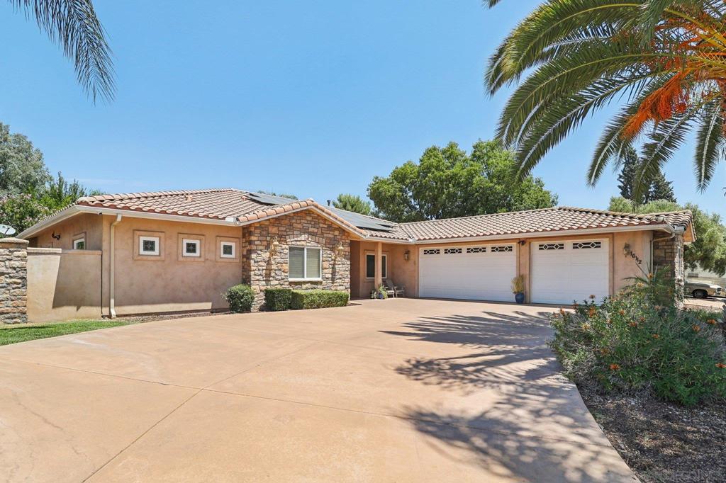 Do not Miss All This San Diego Country Estates Beautifully Custom-Built California Ranch Home w/ Mediterranean Accents offers; Timeless Beauty of Stone and Natural Wood throughout. 4 Bedrooms PLUS Office. ASSUMABLE 2.625% loan, WELL, SOLAR. 9' Ceilings, Open Floorplan leads to the 720 sqft COVERED PATIO w/ Outdoor Kitchen/BBQ, Built-in Fire Pit, Detached 4th Car Garage. 1/2 Court Basketball Court. Over 100' Concreted RV PARKING. 3 ZONE HVAC system installed in 2021 with Top of the Line High Efficiency Dual Fuel w/ the Best indoor Air Quality products available. Water Heater installed in 2024- Water Heater Heat Pump electric hybrid High Efficiency. 6.20 kW DC solar system PRE-PAID until 2039 (no solar bill) Beautifully Updated Kitchen w/ Custom Cherrywood Cabinetry, Quartz Counters, Single Basin Quartz sink, walk-in Pantry. Dining Room has Built-in Seating w/ Storage and Custom-Built Table. Seats 8-10. Oversized-Finished 3 Car Garage (860 sqft) w/ EV Charger. Laundry Room. Master Bedroom has ensuite bathroom w/Walk-in Closet, Separate Toilet room. Jacuzzi bathtub & Separate Shower w/ bench seat. Eaves are Stucco'd for Fire Protection, Surround sound Speakers in Patio, Living and master bedroom. Must See to appreciate all this home has to offer. Located in San Diego Country Estates golf course community. $175/month HOA due includes SO much! Heated Olympic Size Newly re-Surfaced Pool w/Spa and Kiddie Pool. Tennis, Pickleball Courts, Volley Ball, Basketball, fenced playground, horse shoe, Gaga Ball, Concerts in the Park, 4th of July Parade, 2 Equestrian Centers. MUST SEE! ASSUMABLE LOAN TERMS: 25 YEARS remaining at 2.625%. $530k Loan balance. P&I $2389.82/month. Buyer must have remaining funds for down payment. WALK to Gunn Stage Pocket Park, Dog Park, Simon Preserve and local Pizza & Mexican Restaurants, Hardware and Convivence store close by. 1 mile from San Vicente Resort and Par Lounge. Horse Trail located behind the property leads to hiking and biking trails. Enjoy all that SDCEA has to offer with Miles of Trails for equestrian & hiking. Swing Set does not Convey. Video/security Camera in living room