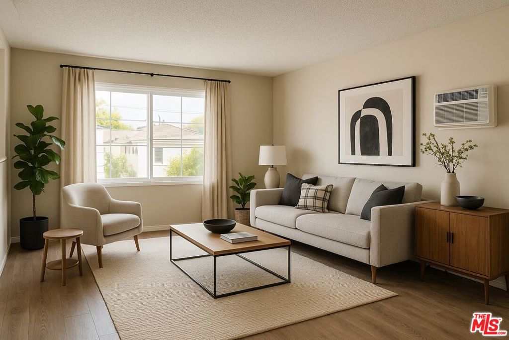 Beverly Hills Adjacent 2 bedroom, 2 bath. Remodeled with wood floors, and dual paned windows. Additional features include: TWO assigned parking spots, plus kitchen with breakfast bar, fridge and oven. Great location in a boutique building with close proximity to desirable restaurants, grocery stores, coffee shops, La Cienega Park, houses of worship, Beverly Center, Pico/Robertson (Beverlywood), 405/10 freeways, and more. Photos may be virtually staged.