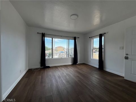 Photo of 7215 S Van Ness Avenue, Los Angeles, CA 90043 (MLS # DW26096570)