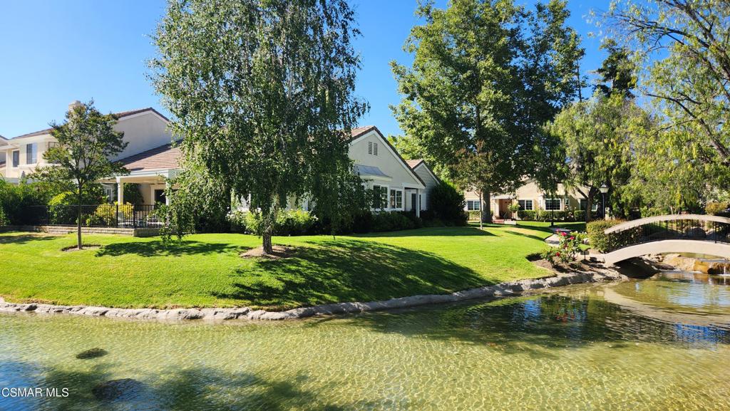 Premier Stoneybrook Single-Story Home with Pool and Brook ViewsNestled in one of Westlake Village's most sought-after communities, this beautifully updated single-story home offers comfort and tranquility, overlooking a serene brook and the community pool--ideal for relaxing and entertaining. This spacious 3-bedroom, 2-bathroom residence features a large living room with vaulted ceilings and sliding doors that open to an inviting patio with peaceful brook views. The formal dining area complements the remodeled kitchen with granite countertops, gas range, built-in microwave, and a charming breakfast nook.The expansive primary suite includes a vaulted ceiling, dual sinks, and a travertine stall shower, with sliding doors leading to the backyard retreat. The indoor laundry room includes built-in cabinetry. Energy-efficient dual-pane windows enhance comfort throughout. Direct access to the 2-car garage adds convenience, and the beautifully landscaped community provides peace and privacy. Just minutes from shops, restaurants, theaters, golf courses, and the lake, this home is perfectly located in the heart of Westlake Village.