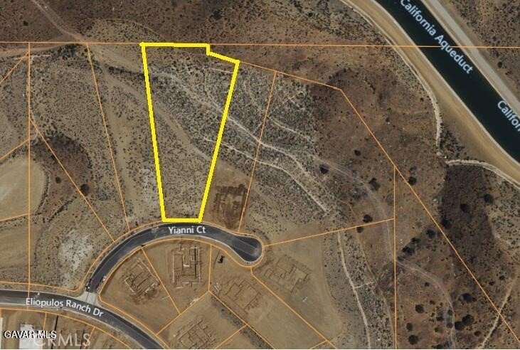 HEARTSTOPPING VIEW FROM THIS FINISHED LOT 1.65 ACRES IN JOSHUA RANCH on Paved Steet with Curbs and Gutters. This Unique flat parcel has room for your Custom Home, Guest Quarters if you want, Elaborate Pool and Outdoor Living Space and probably even a Tennis Court. Overlooking the entire Antelope Valley. Don't miss this Unobstructed View.
