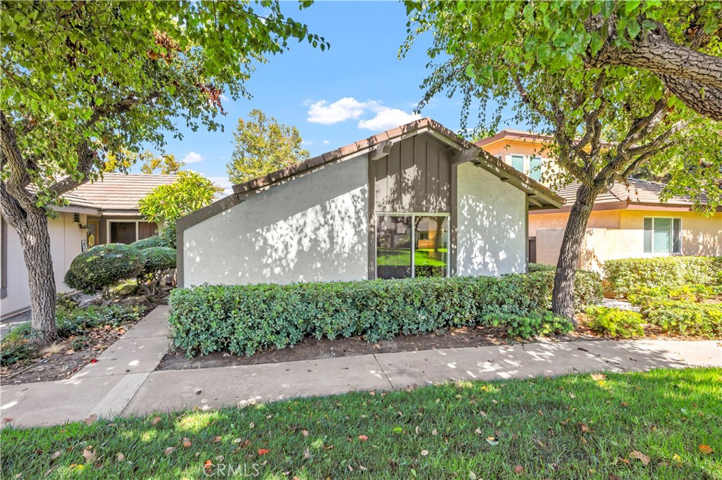 Welcome to this beautifully remodeled 3-bedroom, 2-bath home in the highly desirable Orange Tree neighborhood! Step inside to find fresh interior paint and brand-new LVP flooring throughout, creating a modern and inviting feel. The kitchen shines with new cabinetry, stainless steel appliances, and elegant quartz countertops—perfect for cooking and entertaining. Additional upgrades include dual-pane windows, a new water heater, and a whole-house water filtration system, ensuring comfort and peace of mind. A detached garage with laundry hookups provides convenience, while the spacious side patio is ideal for outdoor dining or relaxing. Enjoy resort-style living with community amenities that feature two sparkling pools, a jacuzzi, clubhouse, fitness center, and lighted tennis and pickleball courts. The location can’t be beat—close to Irvine Valley College, shopping, dining, freeway access, and the Irvine Spectrum.